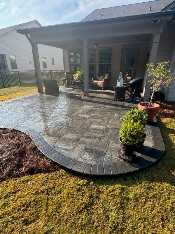 Chic Keystone Paver Patio with Elegant Black Border image
