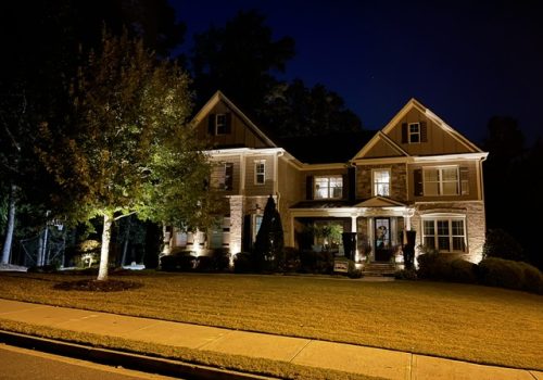 home with fresh cut lawn and landscaping